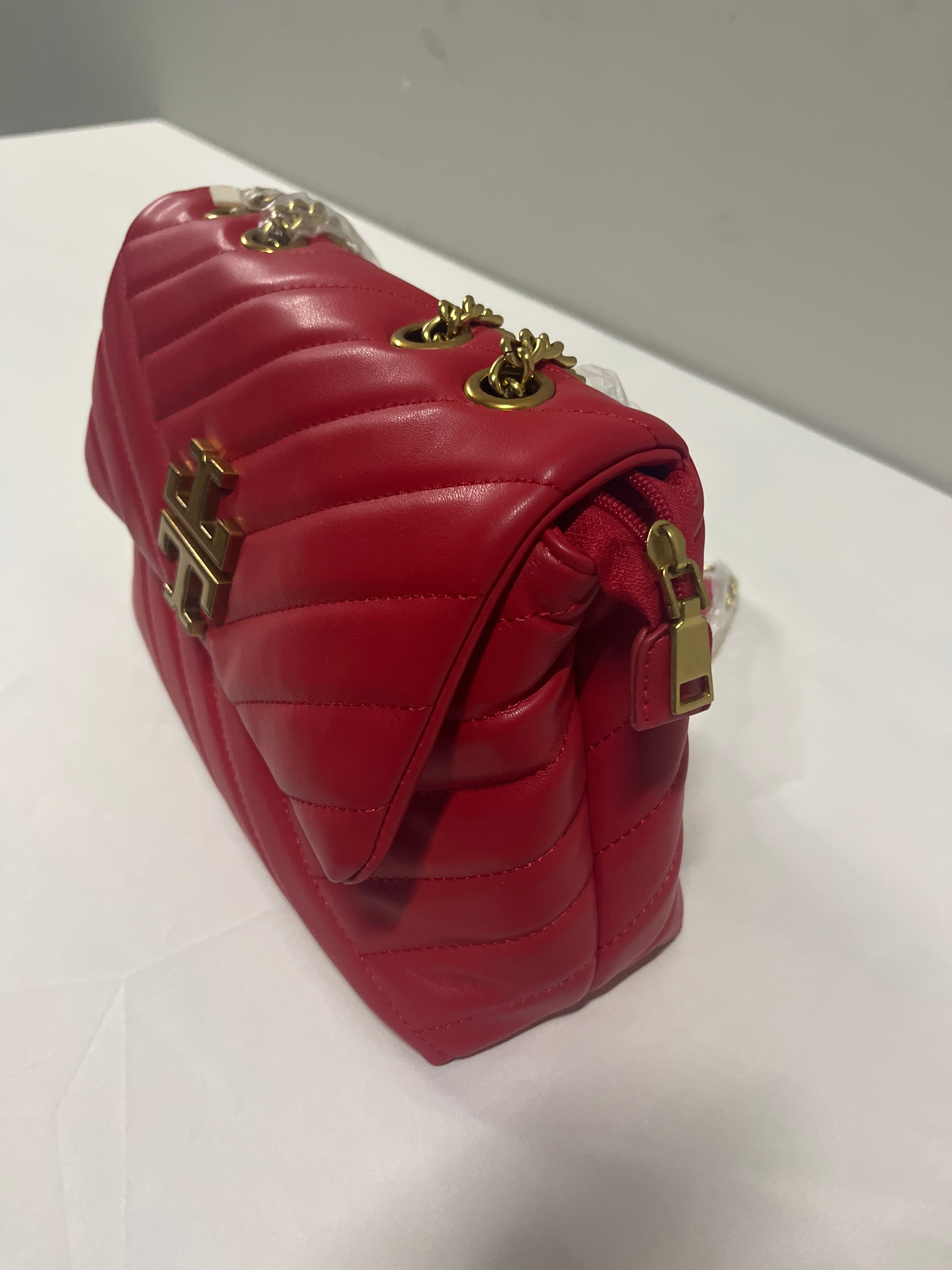 Red, blue, beige, or pink purse