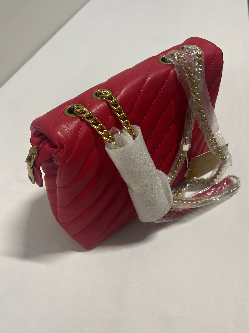 Red, blue, beige, or pink purse