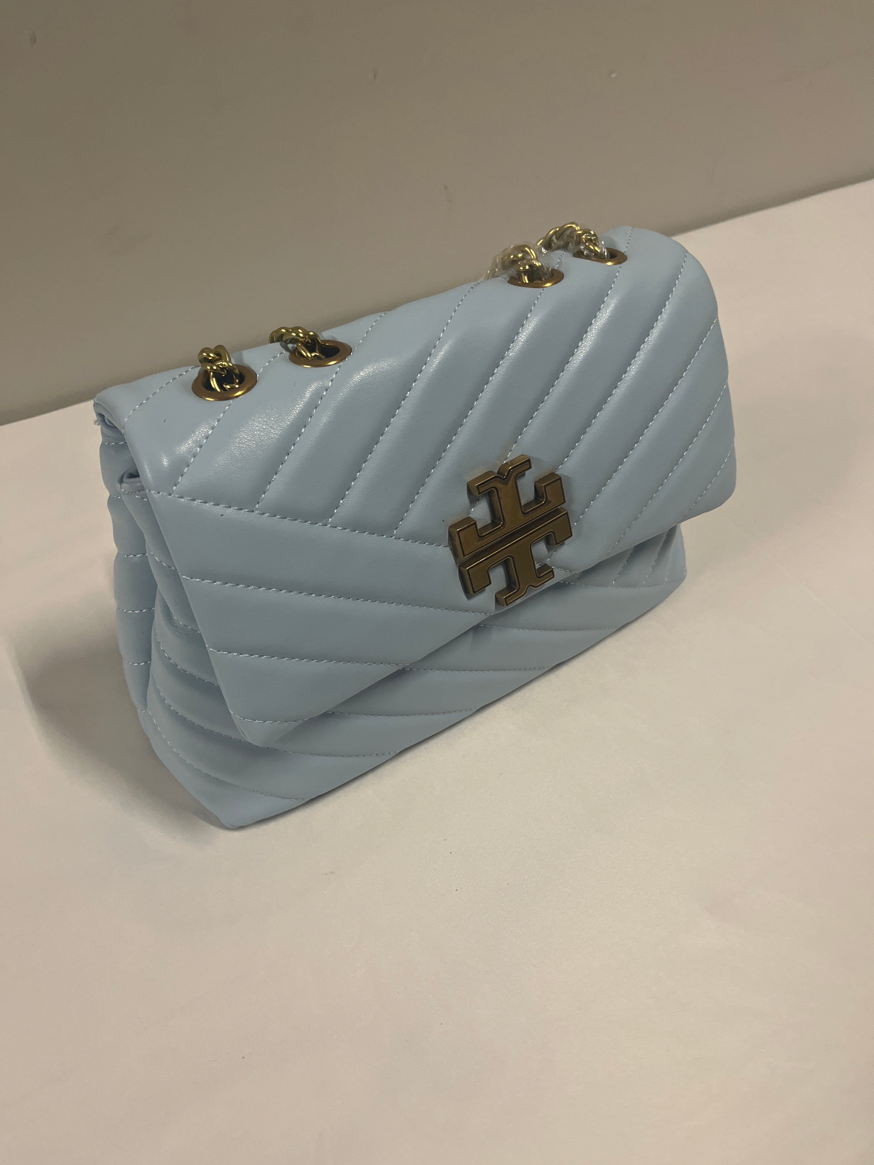 Red, blue, beige, or pink purse