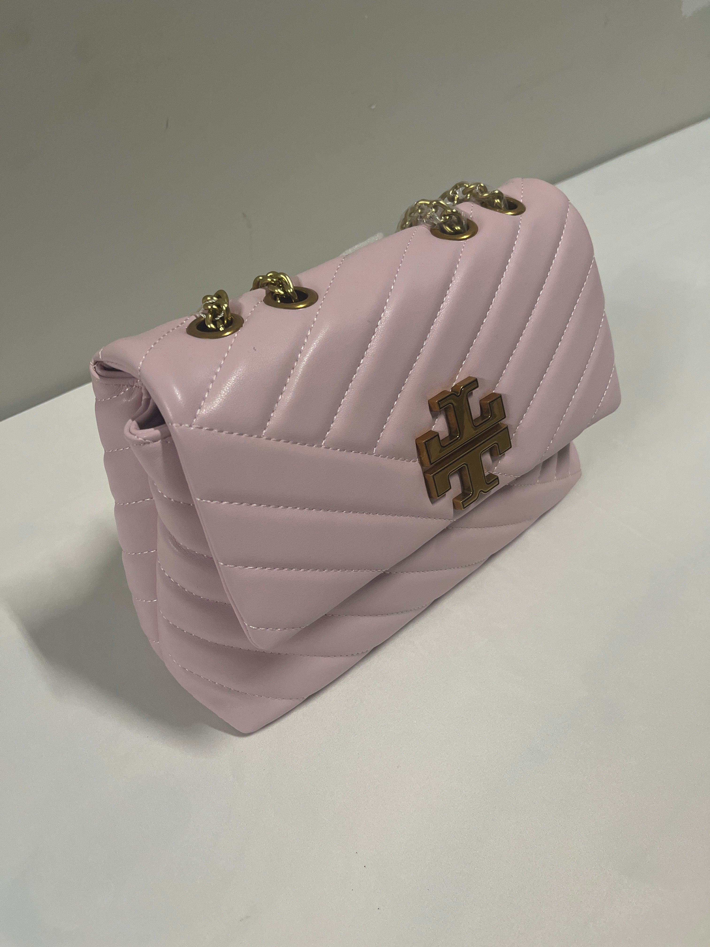 Red, blue, beige, or pink purse