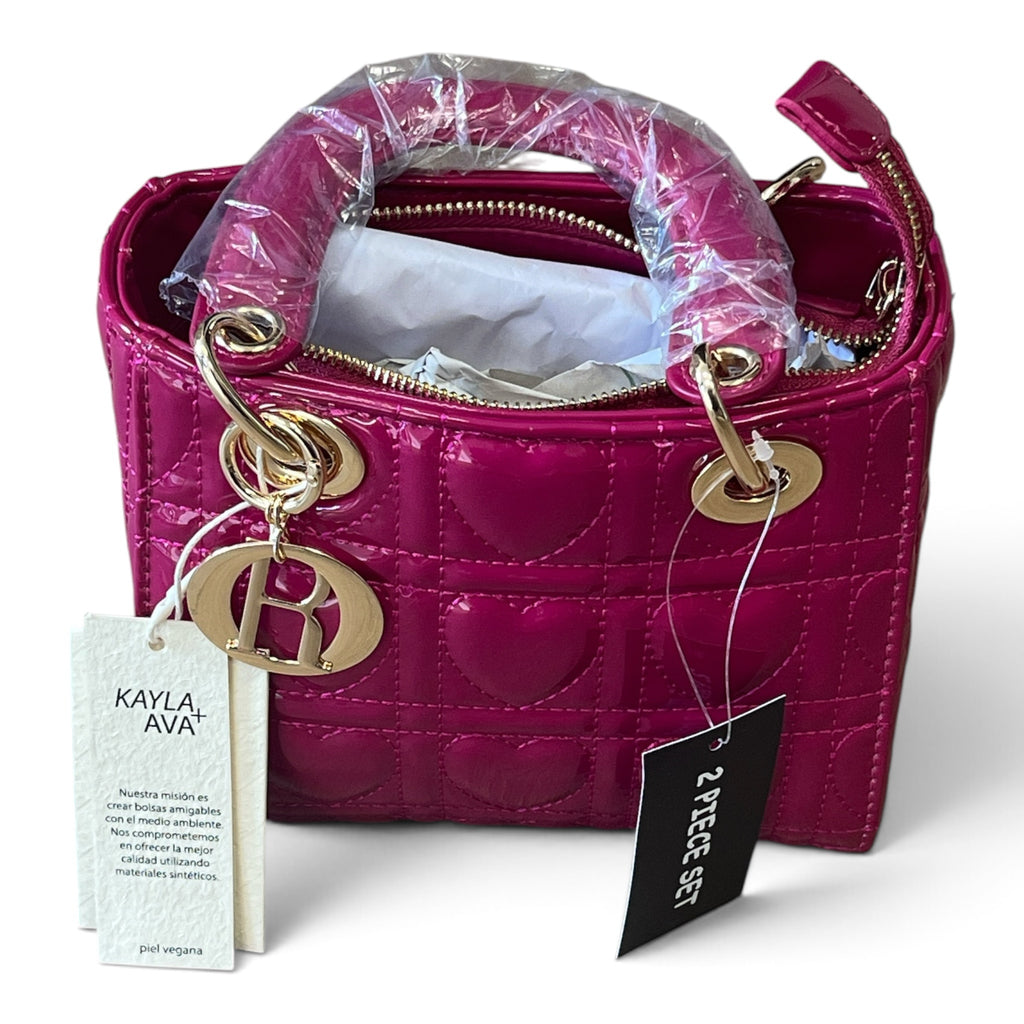 Superlative Online fuchsia pink vegan leather handbag with quilted heart pattern and gold-tone hardware charm